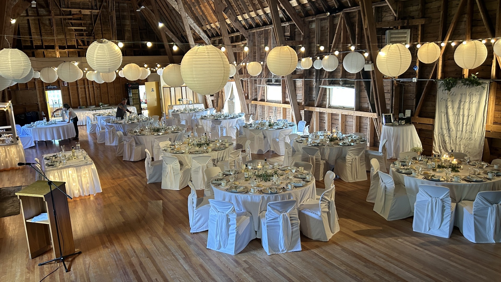 A room set up and decorated for a wedding