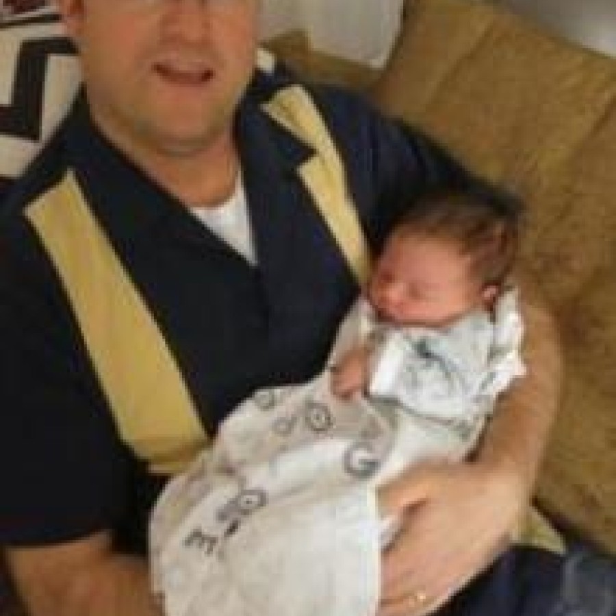 A man holding a baby