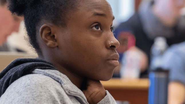 A StFX business student in a classroom