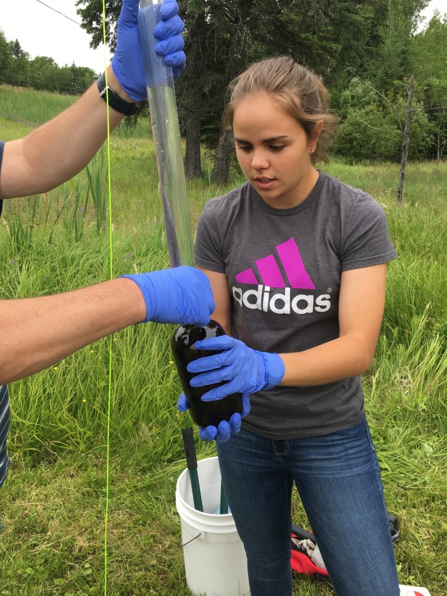 A young person testing groundwater