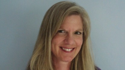 Headshot of a woman with blonde hair