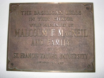A plaque with information about a donation of bells to the university