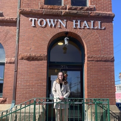 Co-op student standing in front of Town Hall