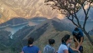 People admiring mountainous view